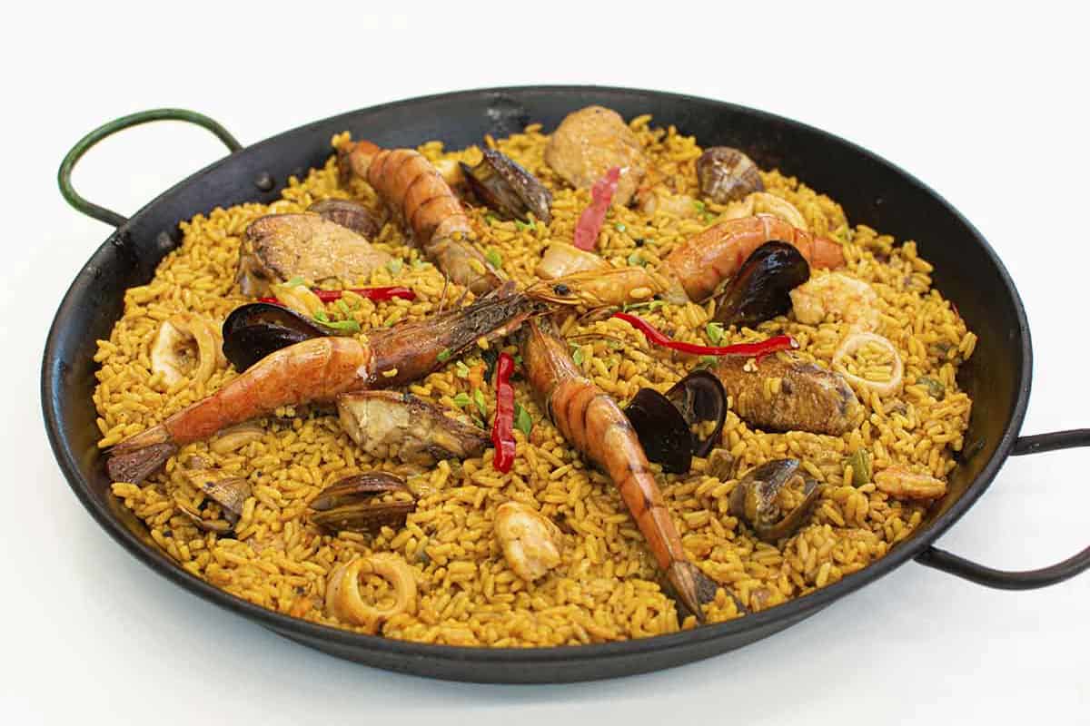 receta de paella de mariscos perfecta, sigue nuestro paso a paso