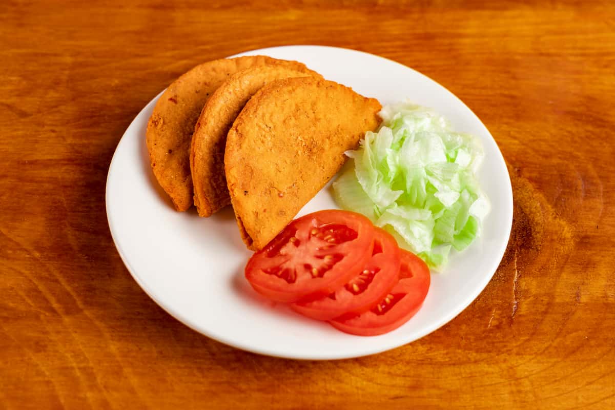 cuál es la diferencia entre las enchiladas queretanas y las potosinas?